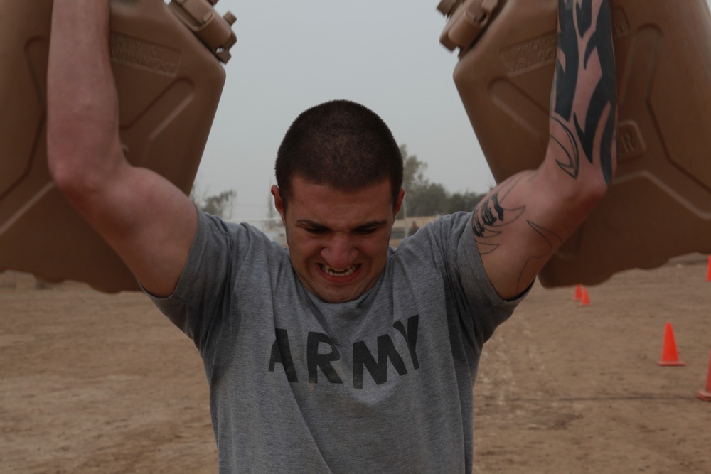 U.S. Soldiers from 2-23 Infantry Regiment play a volleyball game on Camp Taji