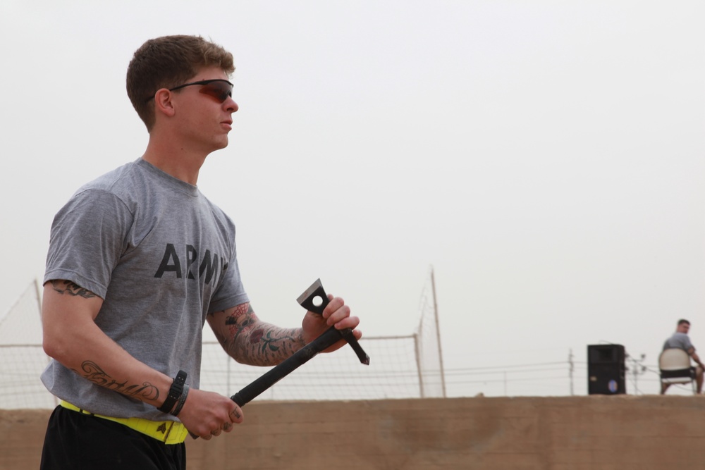 U.S. Soldiers from 2-23 Infantry Regiment play a volleyball game on Camp Taji