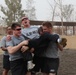 U.S. Soldiers from 2-23 Infantry Regiment play a volleyball game on Camp Taji