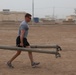 U.S. Soldiers from 2-23 Infantry Regiment play a volleyball game on Camp Taji