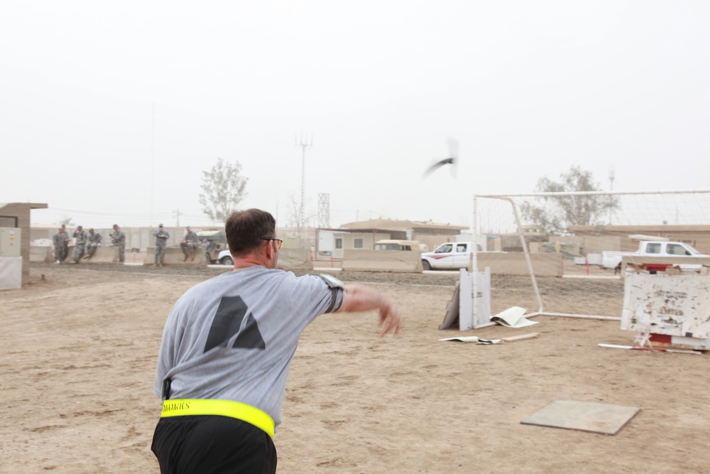 U.S. Soldiers from 2-23 Infantry Regiment play a volleyball game on Camp Taji