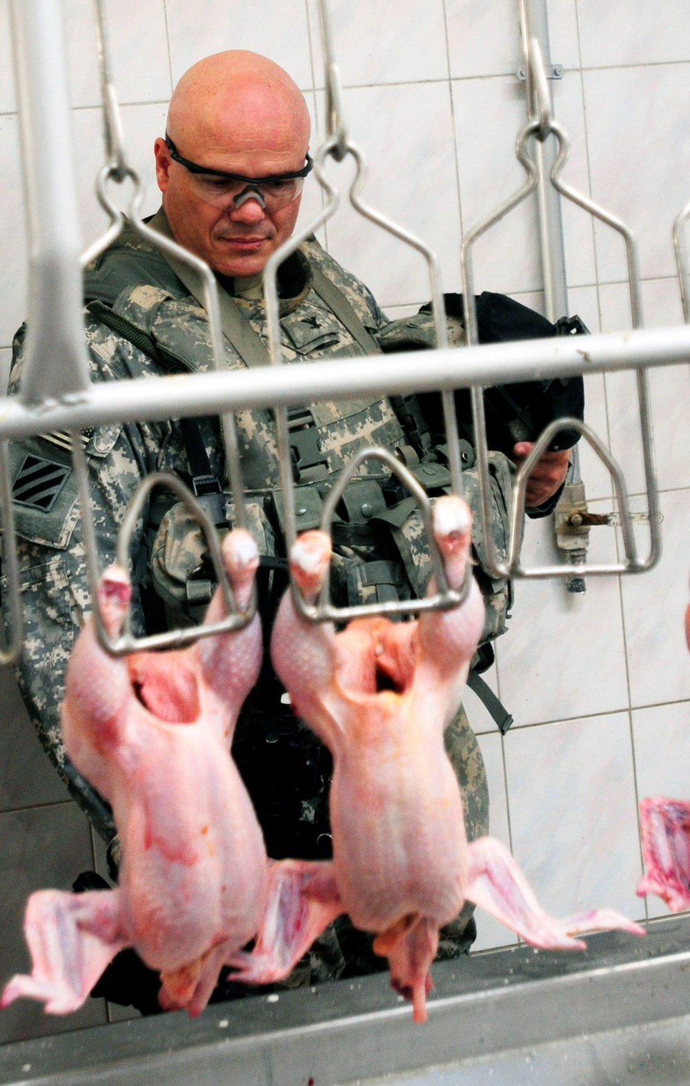 1st Brigade Combat Team-Augmented assists in opening poultry plant that adds jobs
