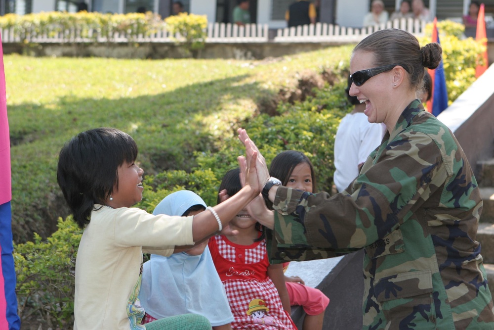 Hundreds Celebrate New School Buildings Built by Filipino Contractors and U.S. Navy Seabees