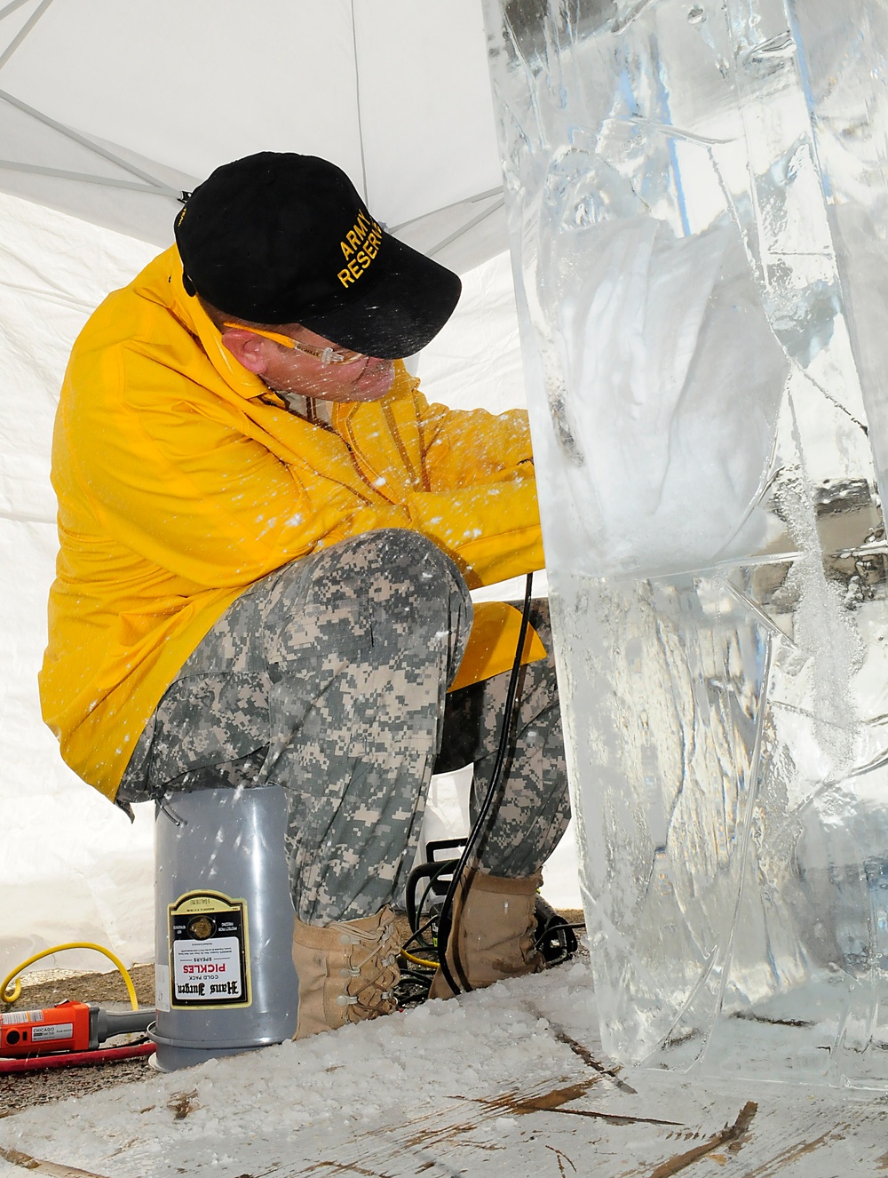 Sgt. Skinner competes in single block ice carving at the Army Culinary Arts Competition
