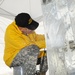 Sgt. Skinner competes in single block ice carving at the Army Culinary Arts Competition