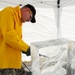 Sgt. Skinner competes in single block ice carving at the Army Culinary Arts Competition