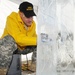 Sgt. Skinner competes in single block ice carving at the Army Culinary Arts Competition