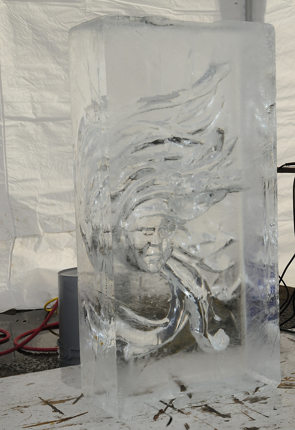 Sgt. Skinner competes in single block ice carving at the Army Culinary Arts Competition