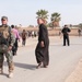 Paratroopers escort global team to polling sites to observe local vote