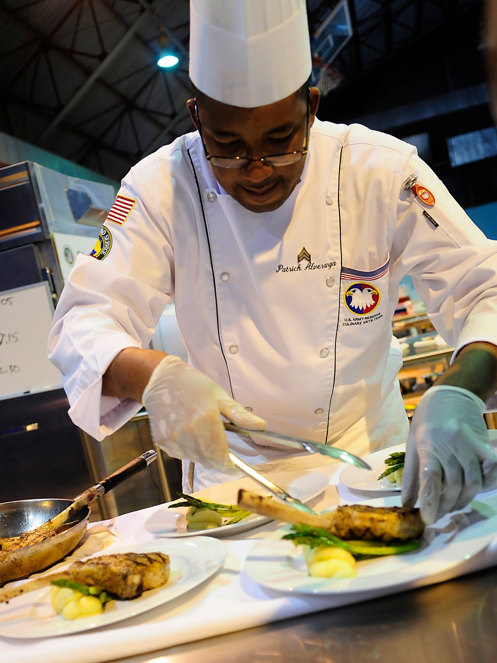 Army Reserve Sgt. Alveranga competes in the Contemporary Category event at Army Culinary Arts Competition