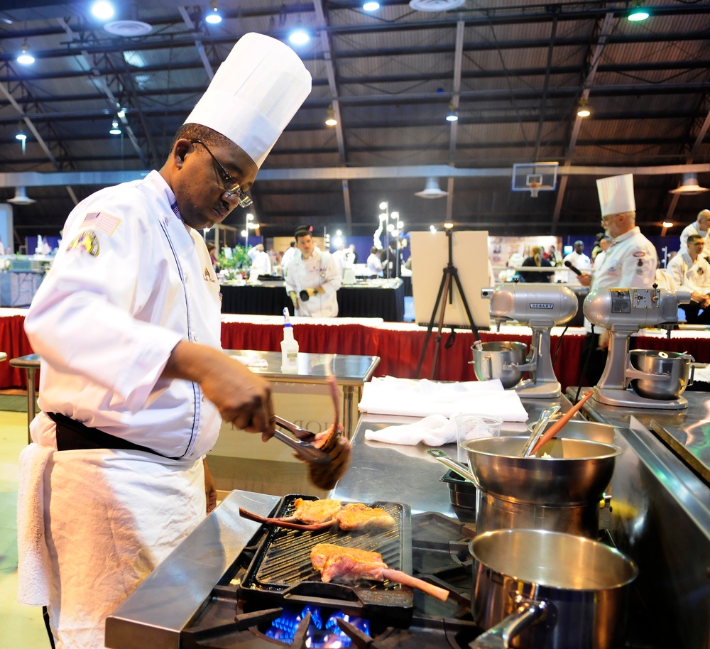 Army Reserve Sgt. Alveranga competes in the Contemporary Category event at Army Culinary Arts Competition
