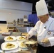 Army Reserve Staff Sgt. McLaughlin competes in the Contemporary Category event at Army Culinary Arts Competition