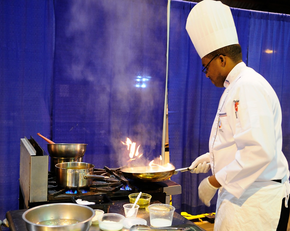 Army Reserve Sgt. Alveranga competes in the Contemporary Category event at Army Culinary Arts Competition
