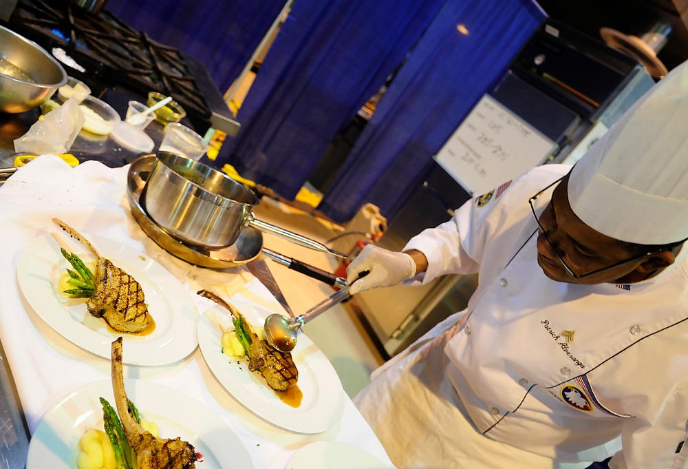 Army Reserve Sgt. Alveranga competes in the Contemporary Category event at Army Culinary Arts Competition