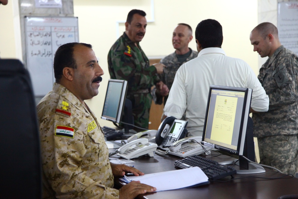 Iraqi security officials meet at the Basra Operations Center