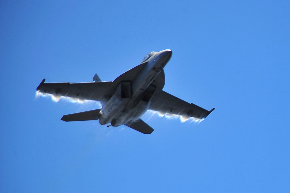 high-speed maneuvers over USS Carl Vinson