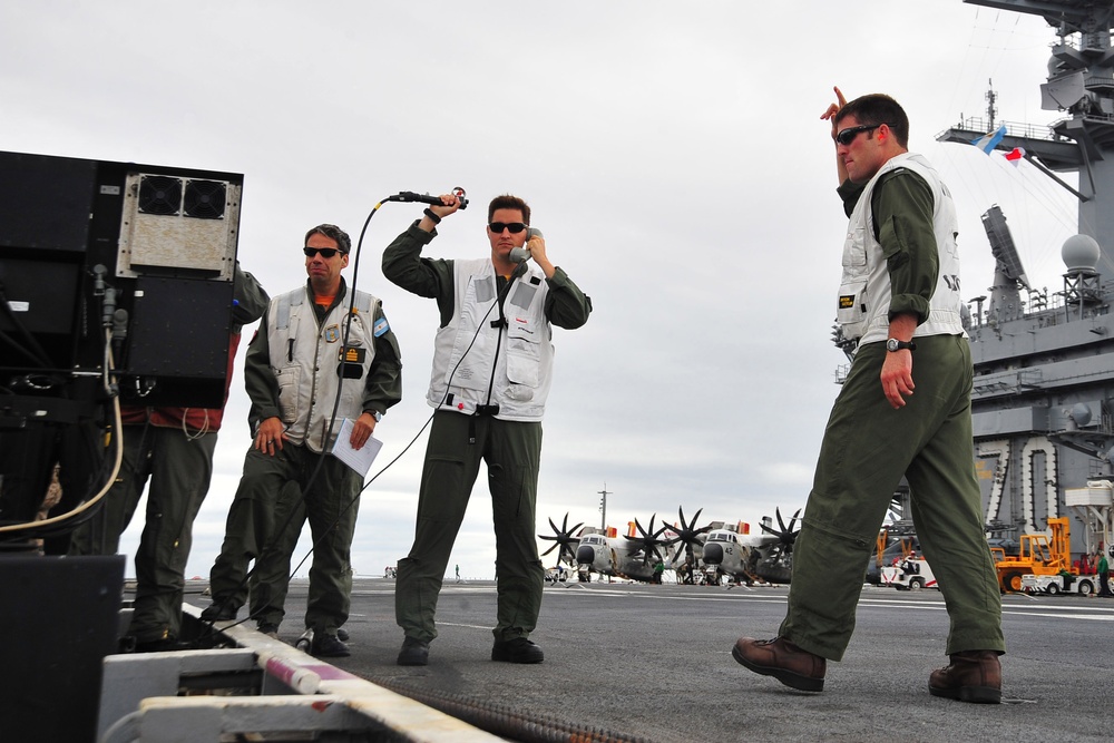 high-speed maneuvers over USS Carl Vinson