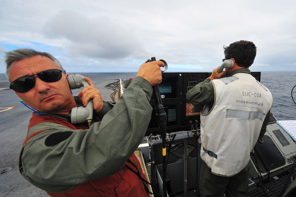 high-speed maneuvers over USS Carl Vinson