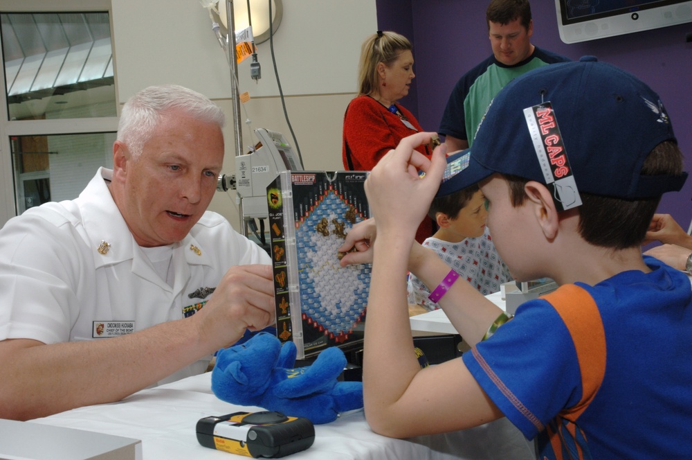 a "Caps for Kids" program visit