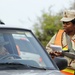 Soldiers inspect vehicles