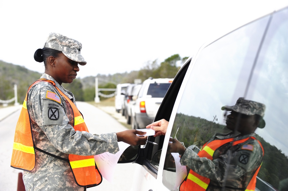 Soldiers inspect vehicles