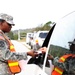 Soldiers inspect vehicles