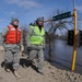 Guardsmen Brave Elements During 12-Hour Dike Patrol Shifts