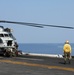 Flight-line mechanics with HMH 461 (Reinforced), 22nd MEU, conduct maintenance on a CH-53E