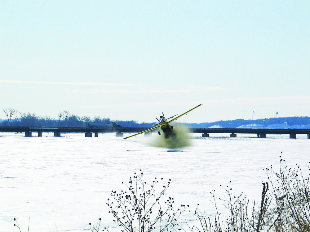 Crop Duster Spreads Ice on Platte River Ice Sheet