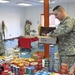 U.S. KFOR junior Soldiers work to help fellow troops