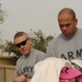 Arizona-based unit brings clothing to give to local community