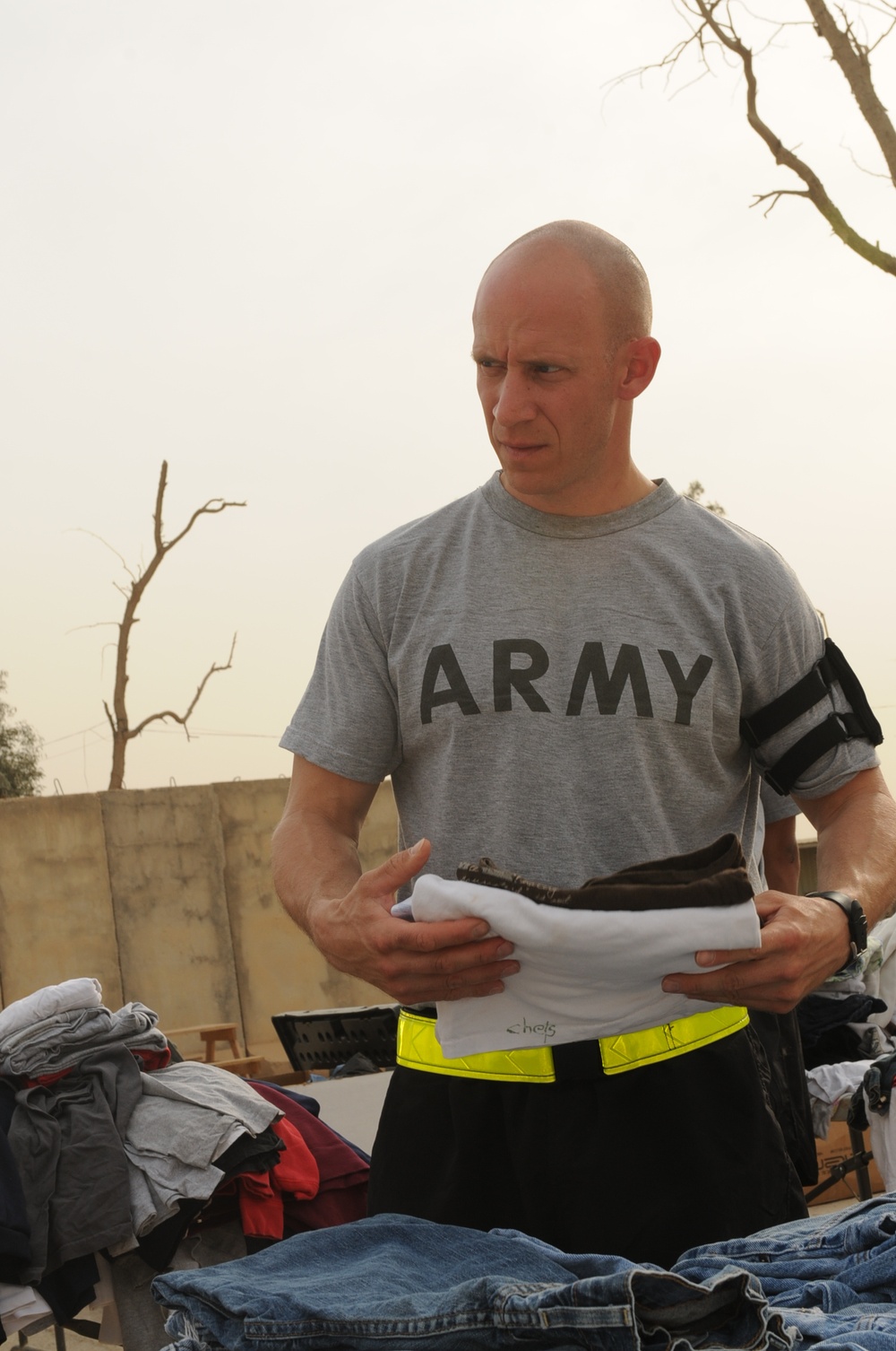 Arizona-based unit brings clothing to give to local community
