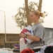 Arizona-based unit brings clothing to give to local community