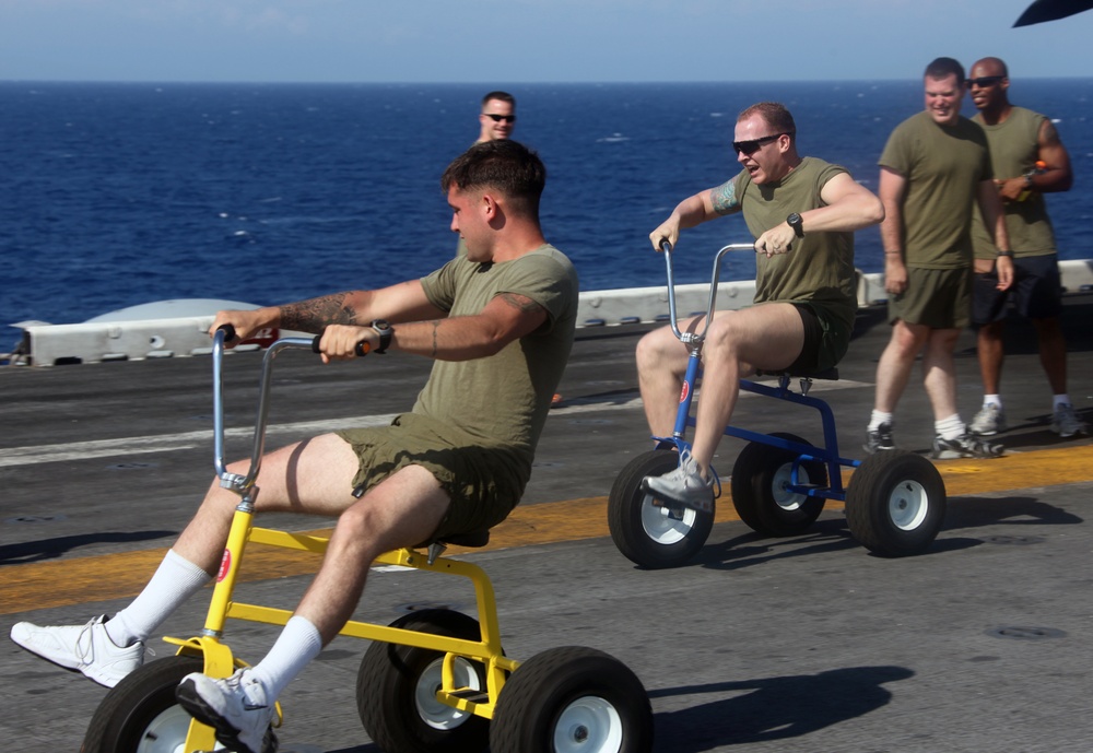 Marines and sailors from the 22nd MEU, and sailors from USS Bataan, participate in a 5-kilometer run