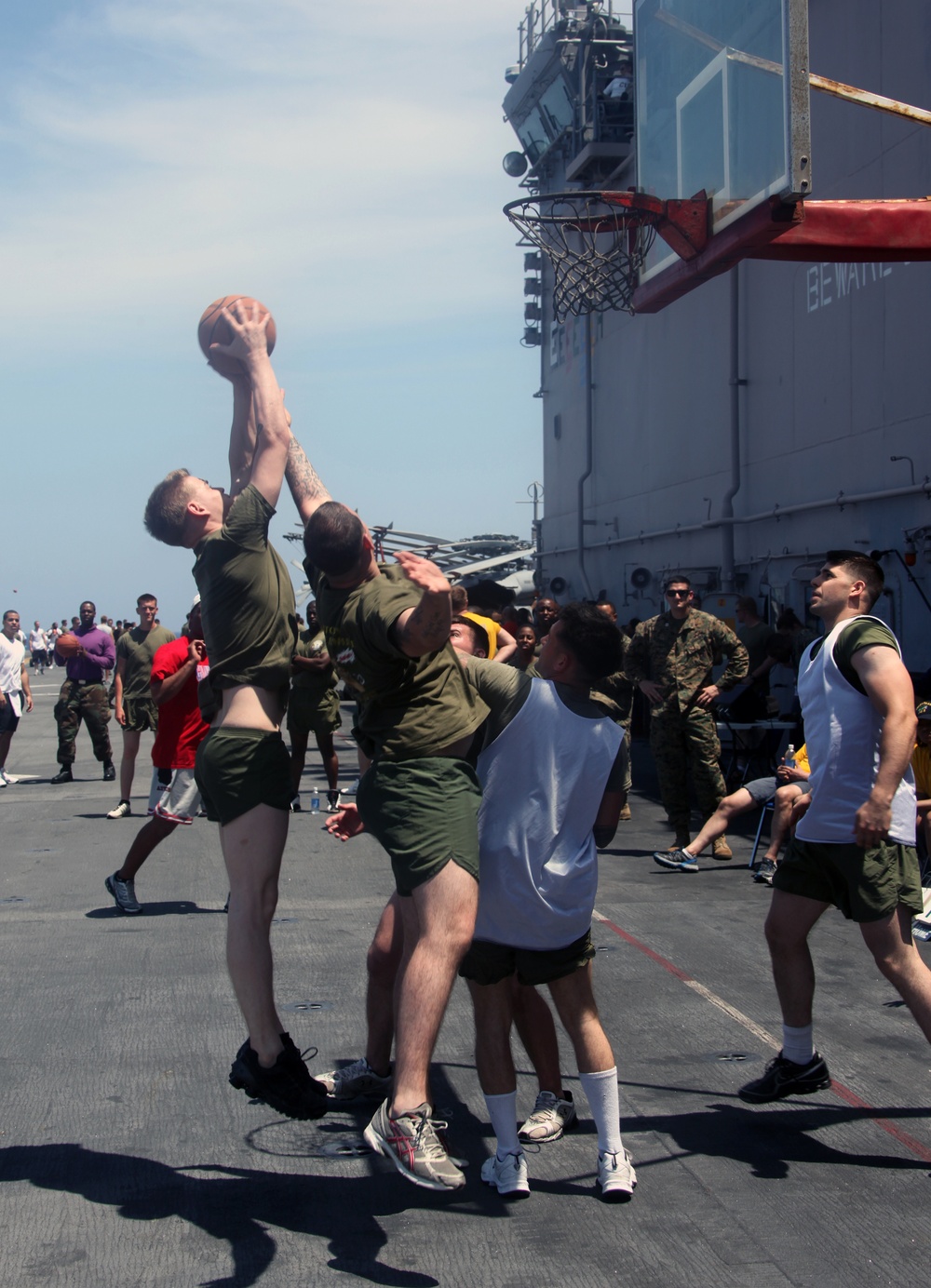 Marines and sailors from the 22nd MEU, and sailors from USS Bataan, participate in a 5-kilometer run