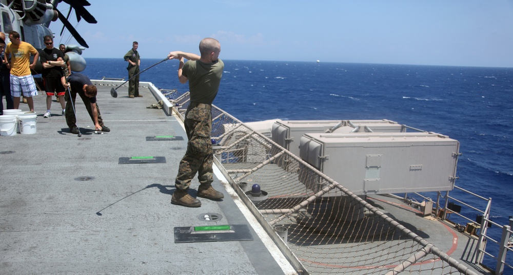 Marines and sailors from the 22nd MEU, and sailors from USS Bataan, participate in a 5-kilometer run