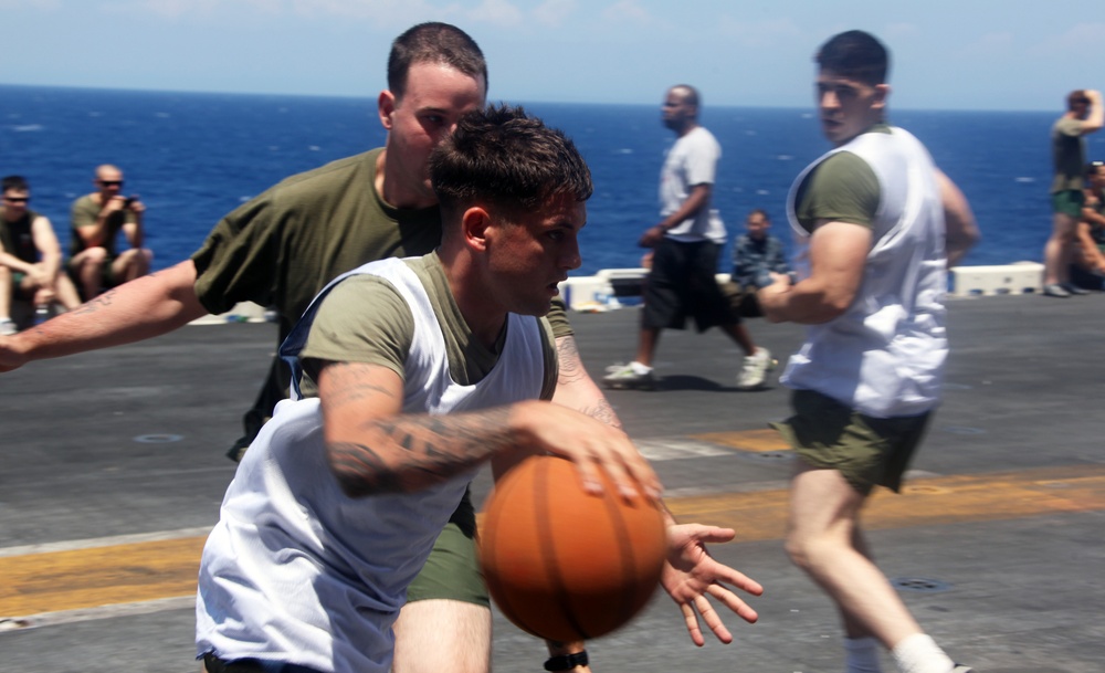 Marines and sailors from the 22nd MEU, and sailors from USS Bataan, participate in a 5-kilometer run