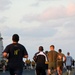 Marines from the 22nd MEU compete in a race aboard USS Bataan, during a Fun-in-the-Sun day