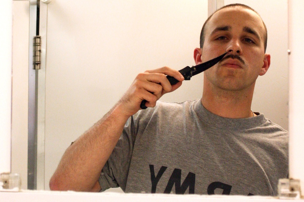 'Stache for cash: Friendly competition grows into hometown charity effort