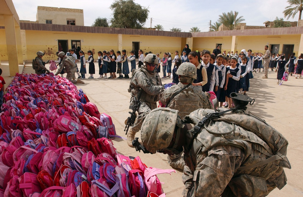 1-38 Infantrymen trade bullets for Barbie backpacks
