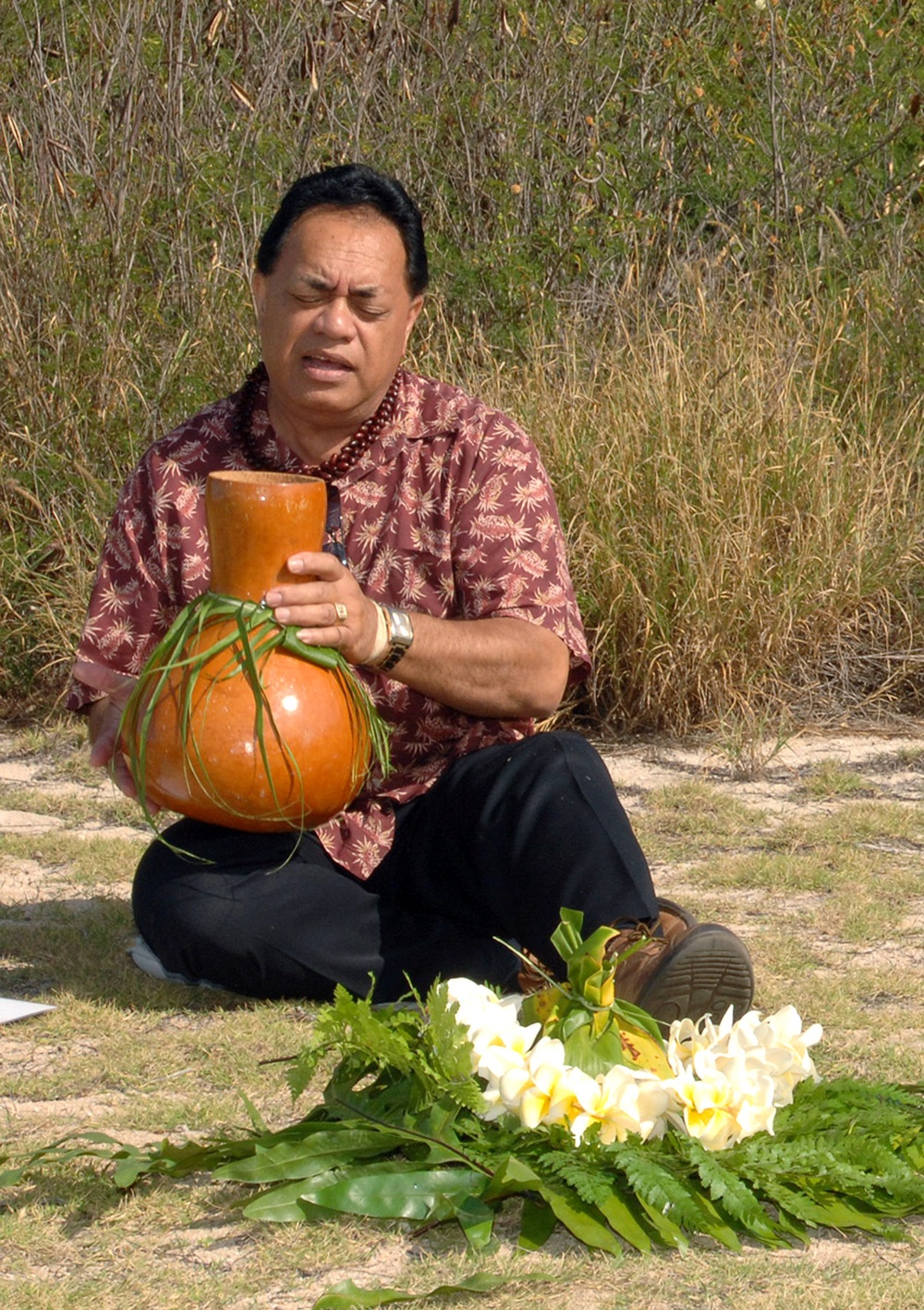 Kunane Aipoalani performs an oli Kunane Aipoalani performs an oli