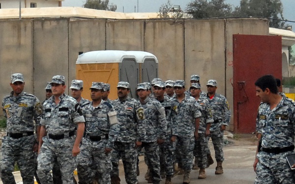 Cavalry Soldiers let Federal Police take over training at TF Nassir