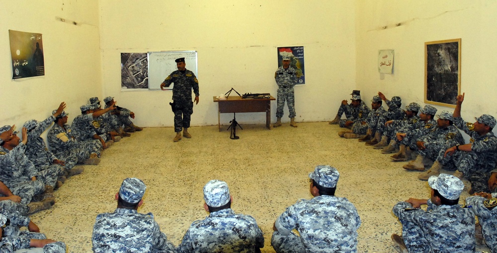 Cavalry Soldiers let Federal Police take over training at TF Nassir