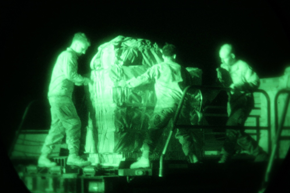 Marines Load Supplies Onto C-130