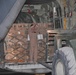 Marines load supplies onto C-130