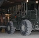 Marines load supplies onto C-130