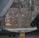 Marines load supplies onto C-130