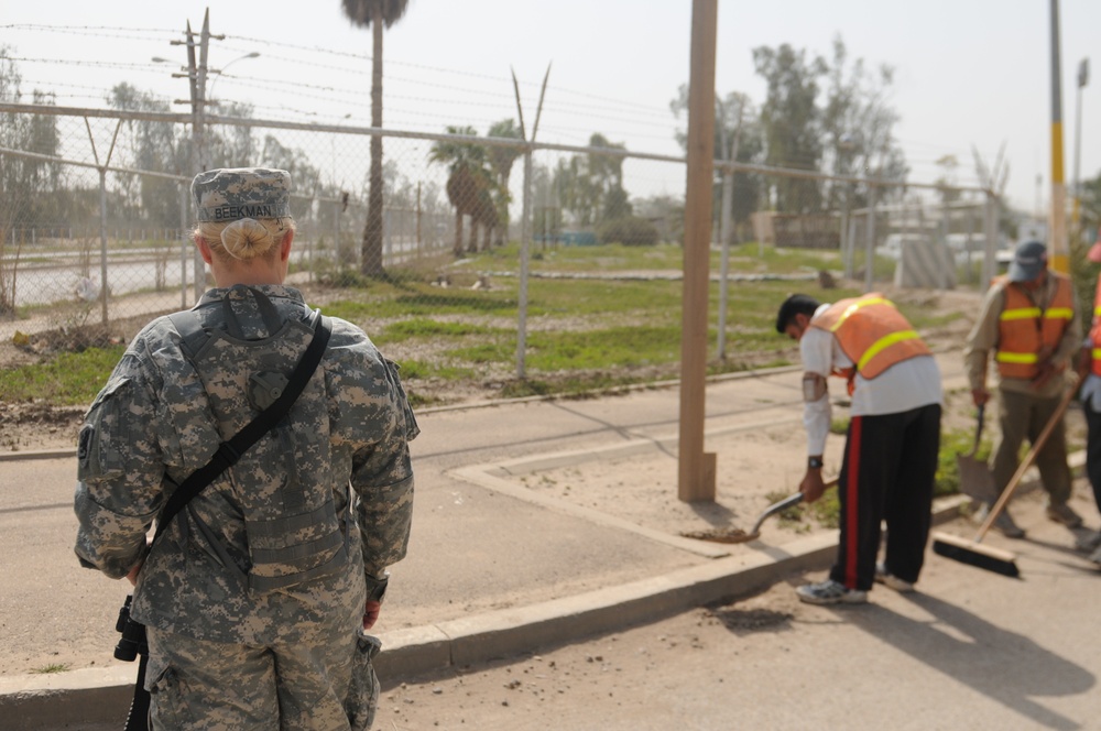 Michigan Guardsmen escort Iraqi workers at JBB