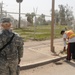Michigan Guardsmen escort Iraqi workers at JBB