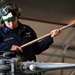 Sailors maintain helicopters